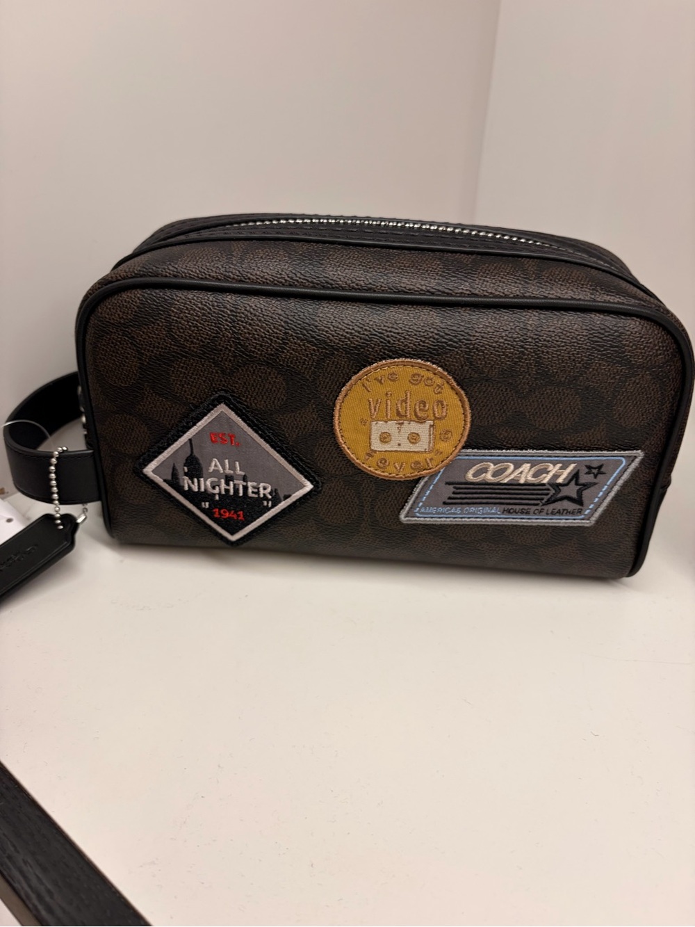 Coach Men's Signature Canvas Travel kit Case in dark brown leather with patch